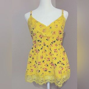 Summer blouse.  New.  Its color is yellow and pink.  Soft.  casual .  Fancy